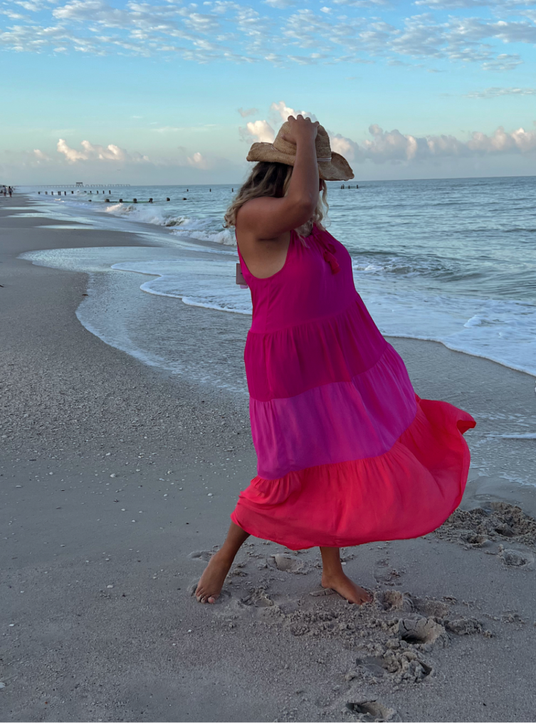 pink dress on beach